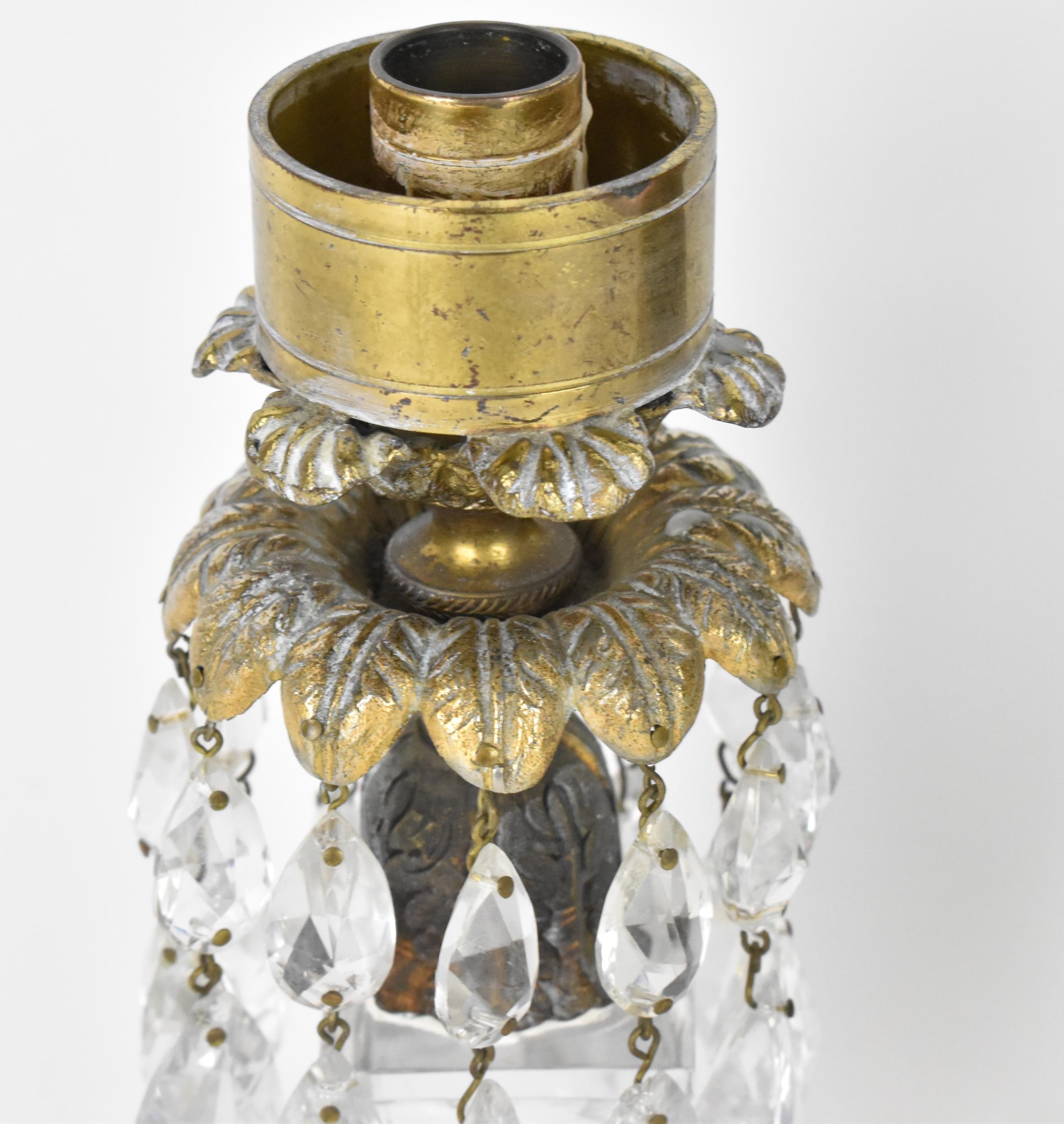 A pair of Regency style candlesticks, the cast palm leaf drip pan with hanging faceted glass pear - Image 2 of 4