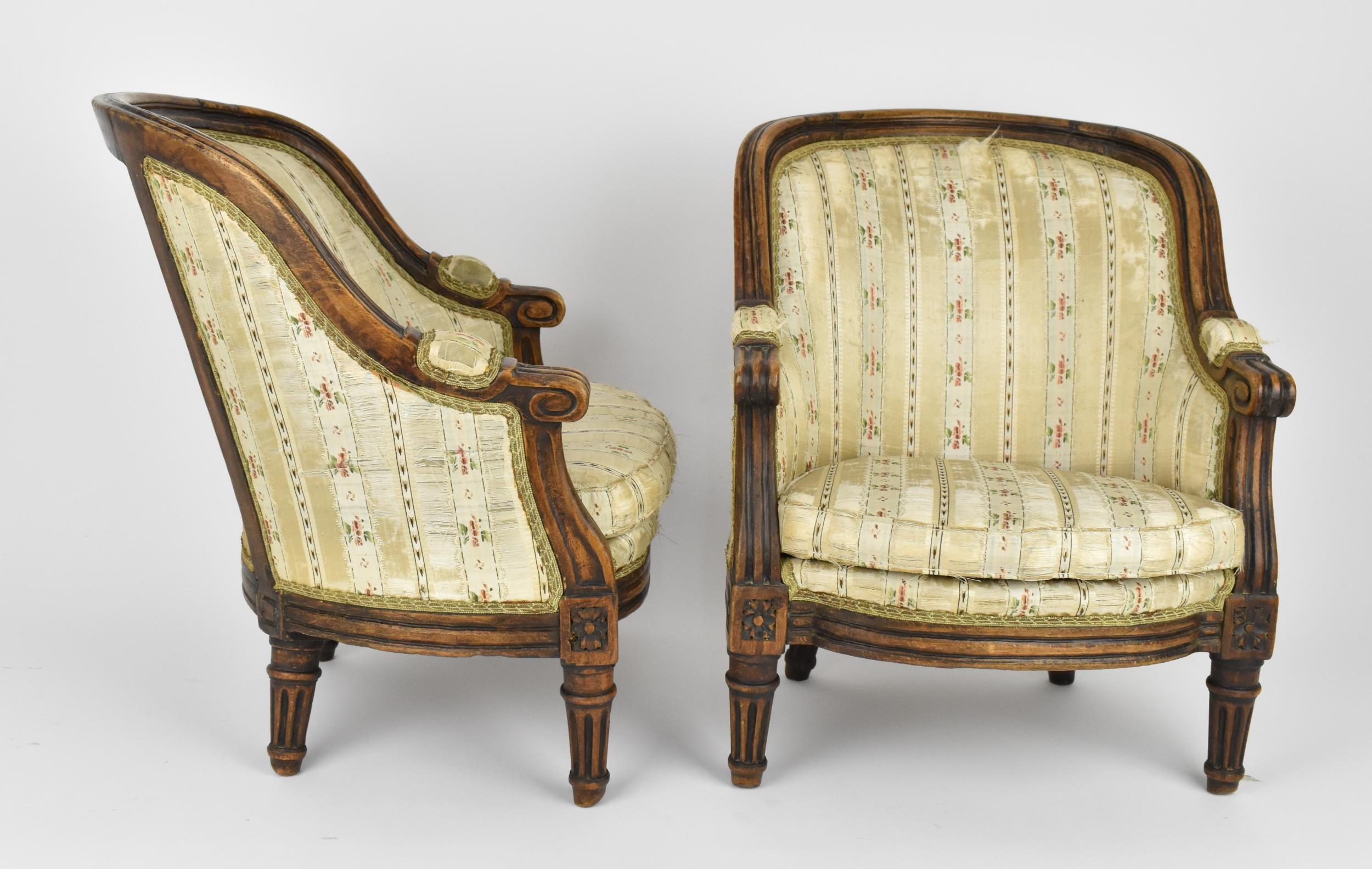 A pair of 18th century French Louis XVI bergère armchairs, circa 1780, with channelled mahogany - Image 3 of 9