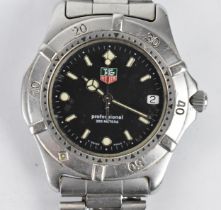 An Tag Heuer gartz, gents stainless steel wristwatch, having a black dial signed Professional, 200