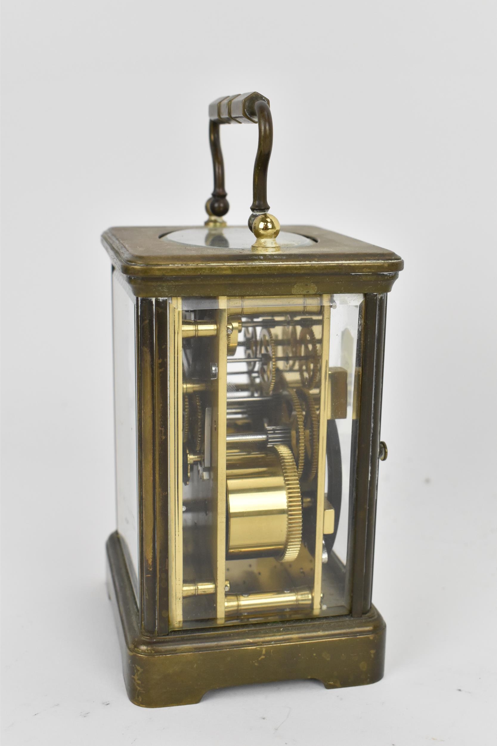 An early/mid 20th century brass cased carriage clock, white enamel dial signed 'Rapport Fondee en - Image 4 of 7