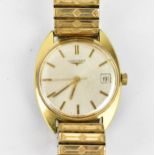 A Longines manual wind, gents, gold plated wristwatch, having a silvered dial with centre seconds,