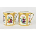 A pair of early 19th century English porcelain demi tasse cups, possibly by Coalport, with