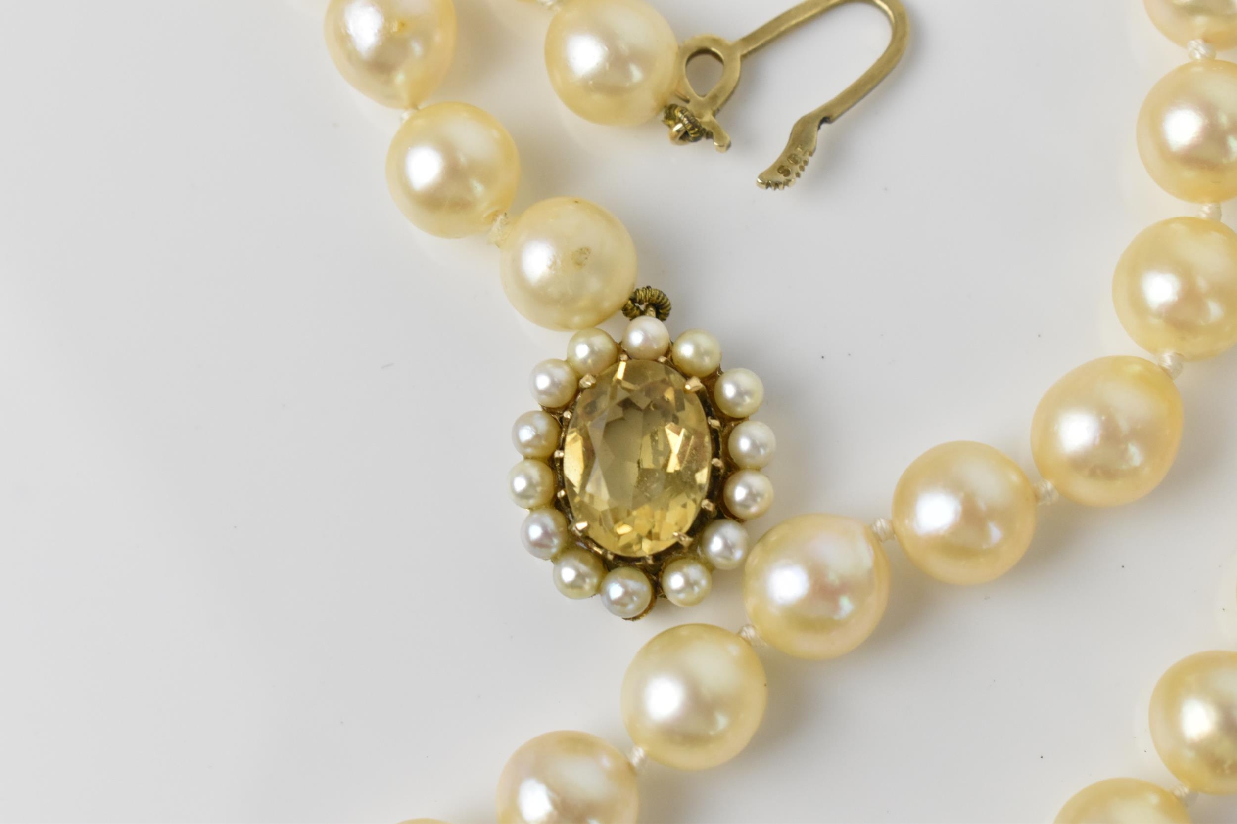 A single strand of cultured white pearls, with 9ct yellow gold, seed pearl and oval cut citrine - Image 2 of 6