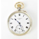 An early 20th century Charles Frodsham, silver open faced pocket watch having a white enamel dial,