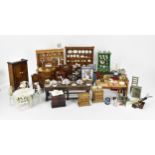 A collection of doll's house furniture and objects, to include kitchenalia, stoves, dressers,