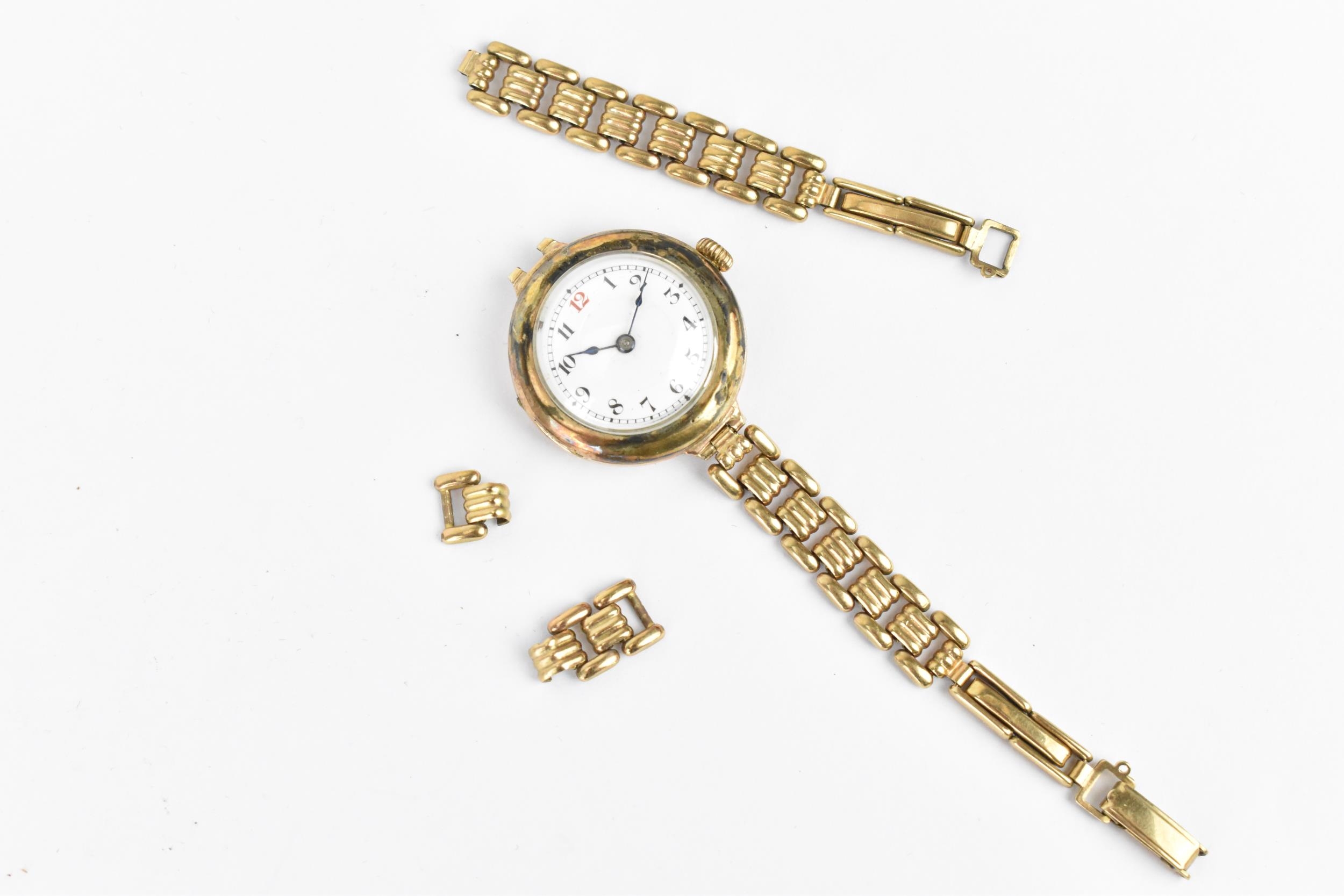 An early 20th century ladies 9ct gold cased manual wind wristwatch having a white enamel dial with - Image 2 of 3