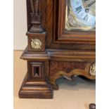 A late 19th century Reinhold Schnekenburger bracket clock with wall hanging bracket, the mixed