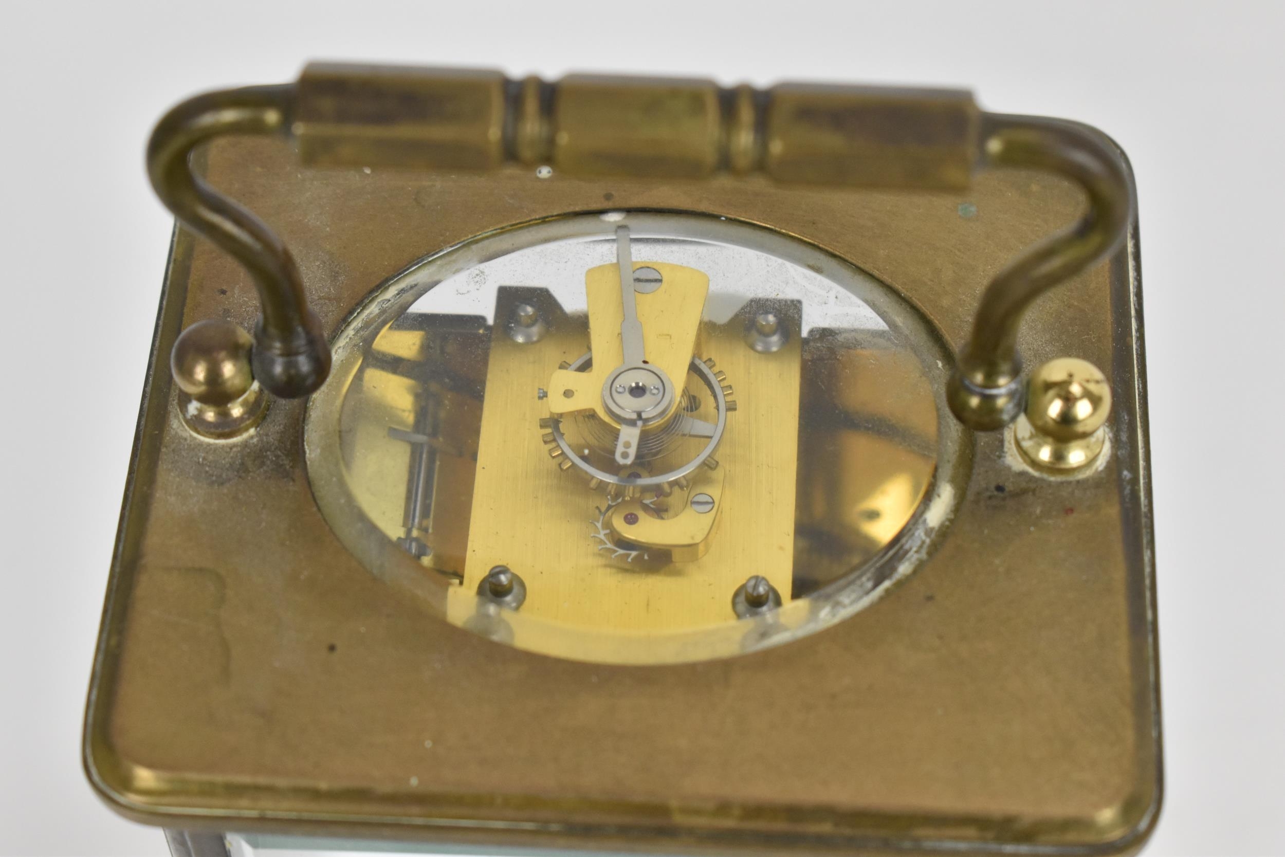An early/mid 20th century brass cased carriage clock, white enamel dial signed 'Rapport Fondee en - Image 3 of 7