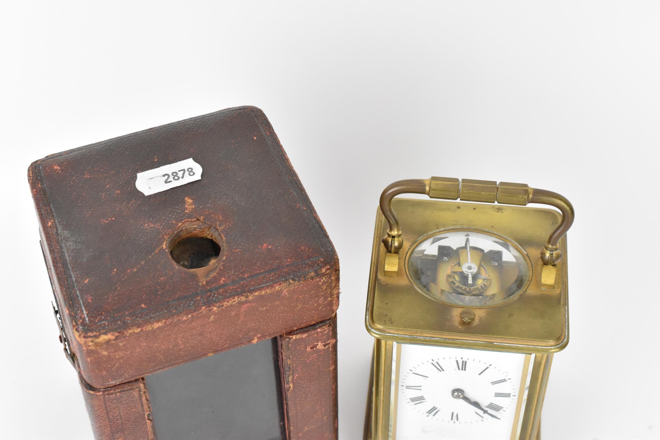 An early 20th century brass cased repeater carriage clock having a white enamel dial with Roman - Image 2 of 8