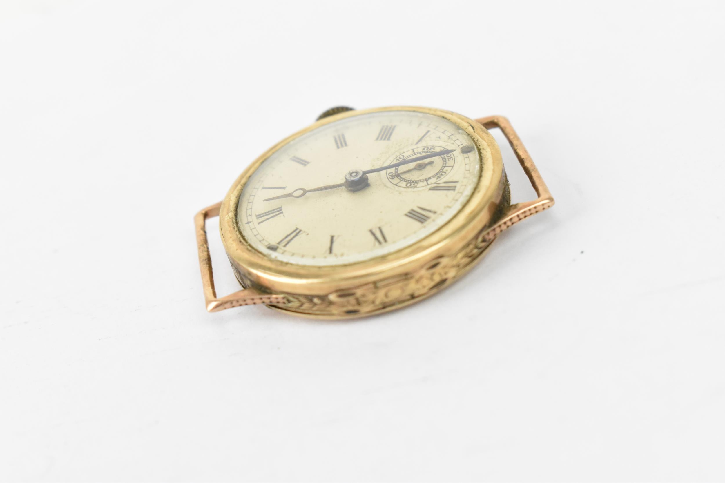 A manual wind, boys size 9ct gold wristwatch having a silvered dial with Roman numerals, blued hands - Image 4 of 4