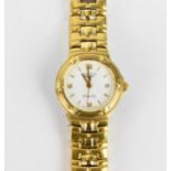 A Longines quartz, ladies gold plated wristwatch having a white enamel dial signed Longines Flagship