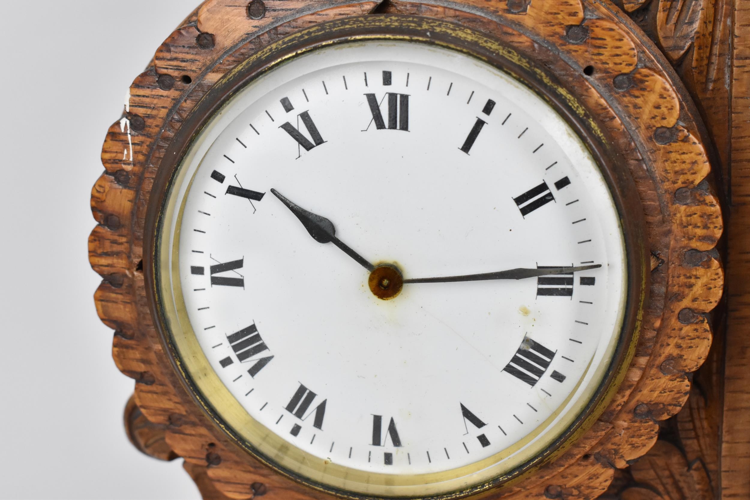 An early 20th century oak combination table clock, barometer and thermometer, having a scroll carved - Image 3 of 7