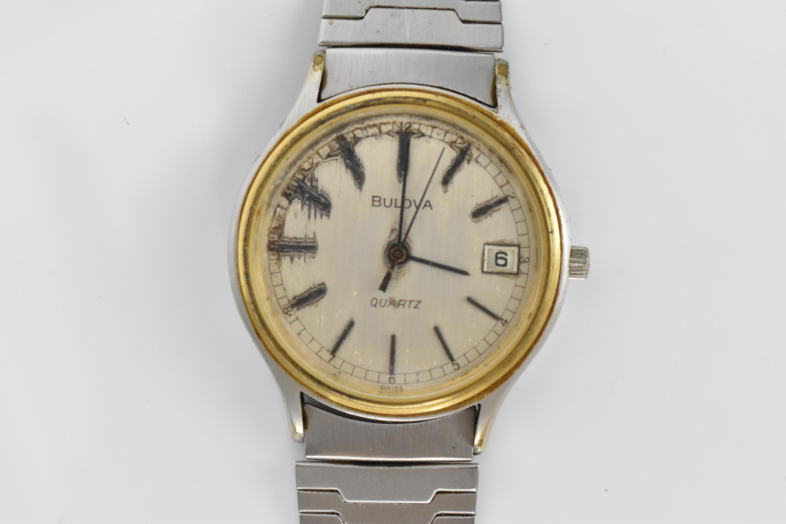 A Bulova quartz, gents stainless steel wristwatch, circa 1979 having a silvered dial with centre - Image 4 of 5