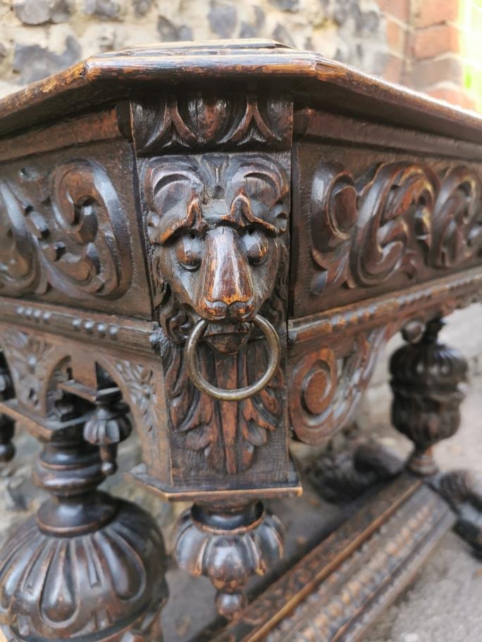 A 19th century Renaissance style carved oak library table, possibly French, with carved dolphin - Image 5 of 7