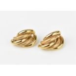 A pair of 9ct yellow gold earrings, designed with alternating textured demi-hoops, combined weight 9