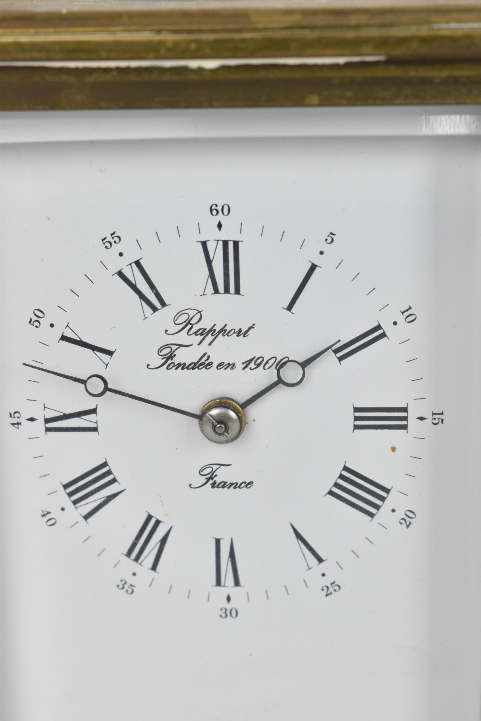 An early/mid 20th century brass cased carriage clock, white enamel dial signed 'Rapport Fondee en - Image 2 of 7