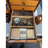 A vintage watchmakers chest of fourteen drawers containing Bergeon rotary drills, screwdrivers,