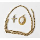 A yellow metal rolo chain necklace, together with a yellow metal mounted cameo brooch with a