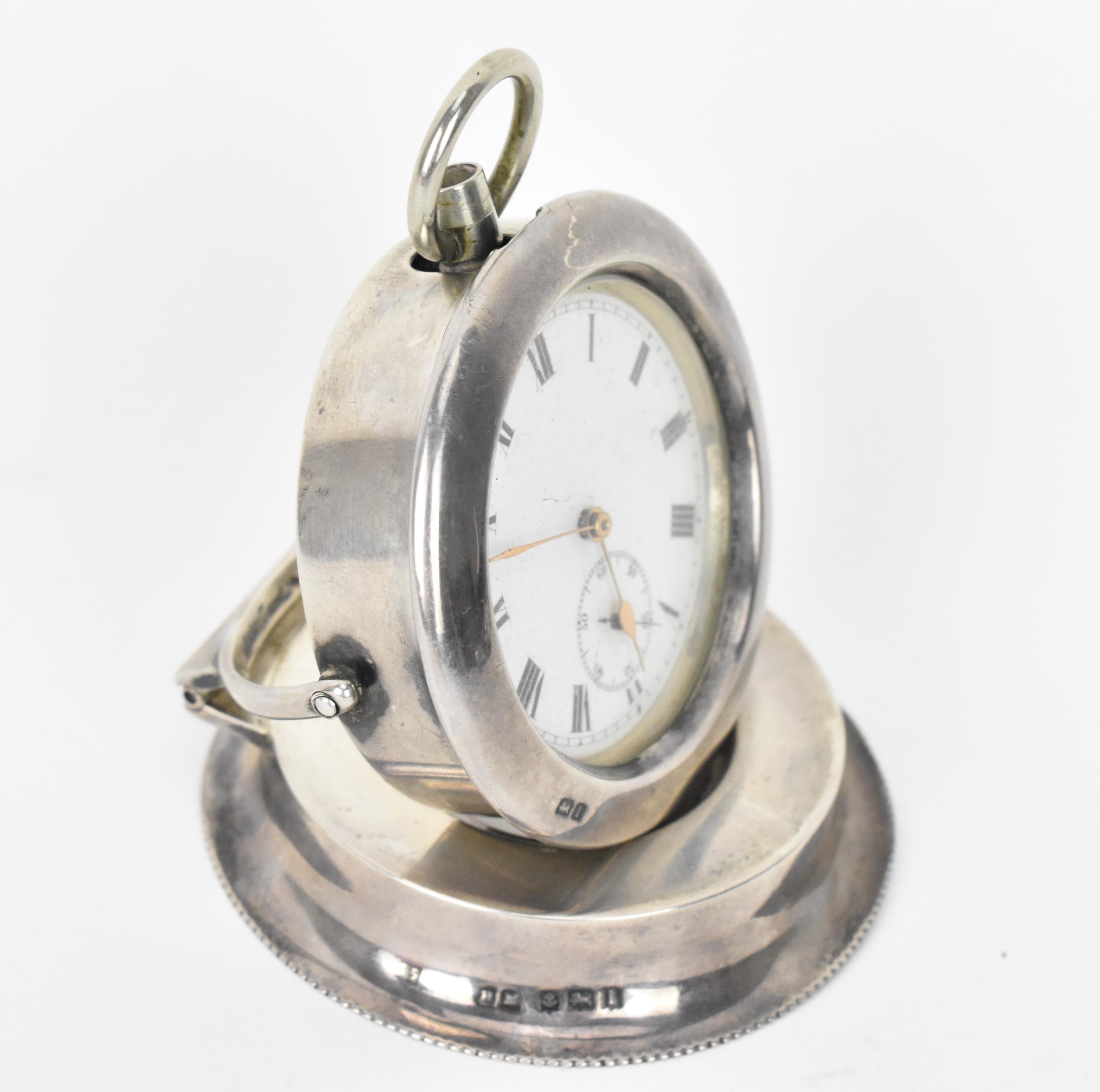 An early 20th century open faced pocket watch having a white enamel dial, with gilt hands, Roman - Image 2 of 6