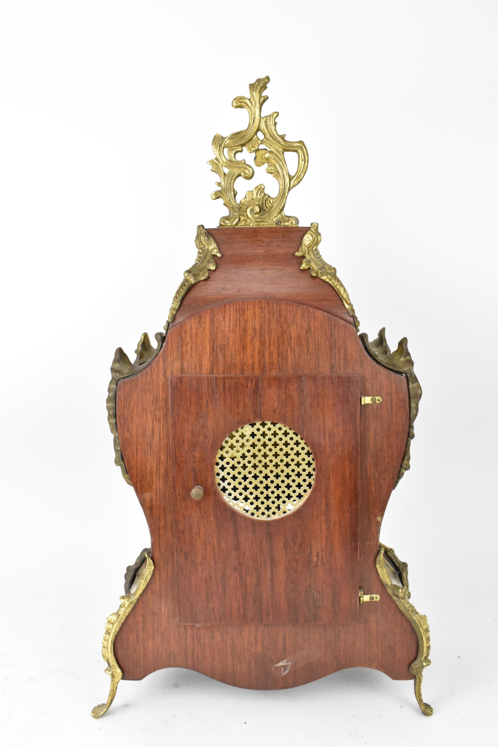 A 20th century French boulle work mantle clock having applied gilt metal C scroll and floral - Image 8 of 10