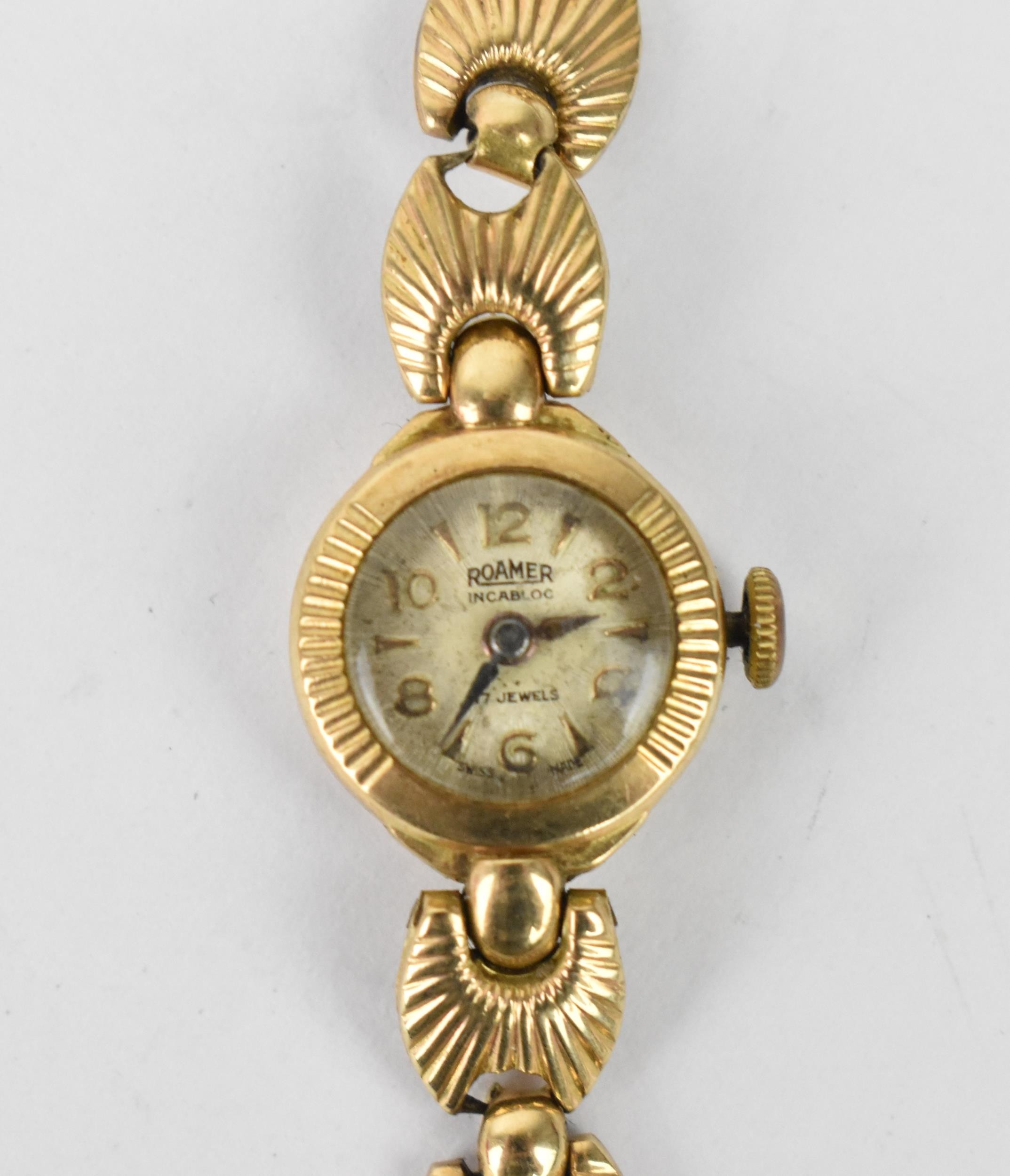 A mid 20th century Roamer manual wind, ladies 9ct gold wristwatch having a silvered dial with Arabic