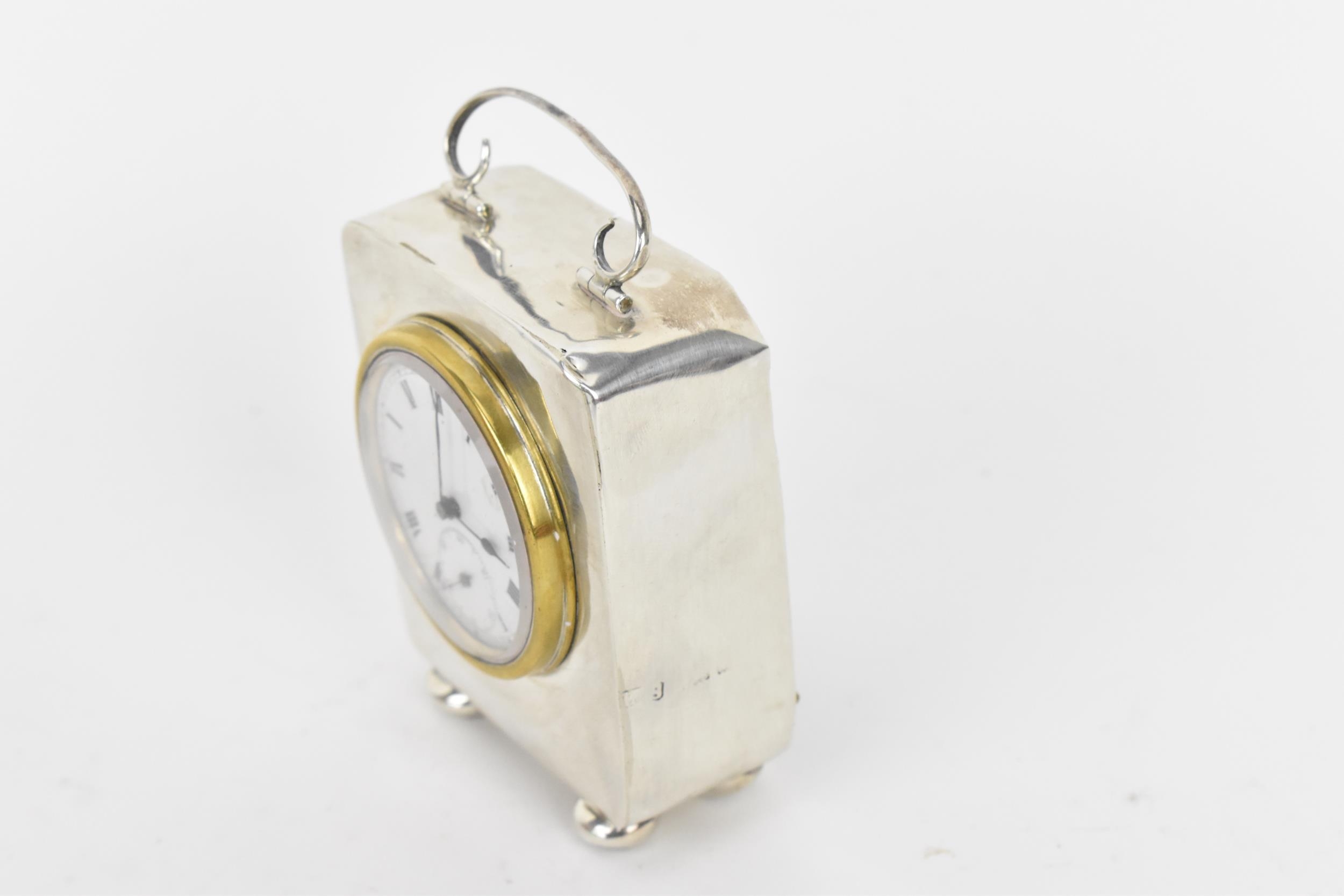 An early 20th century miniature silver cased carriage clock, the case having scroll handle with - Image 3 of 5