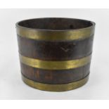 A Georgian brass bound mahogany wine cooler, 30 cm high x 41 cm diameter Provenance: Contents of the