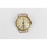 A manual wind, boys size 9ct gold wristwatch having a silvered dial with Roman numerals, blued hands