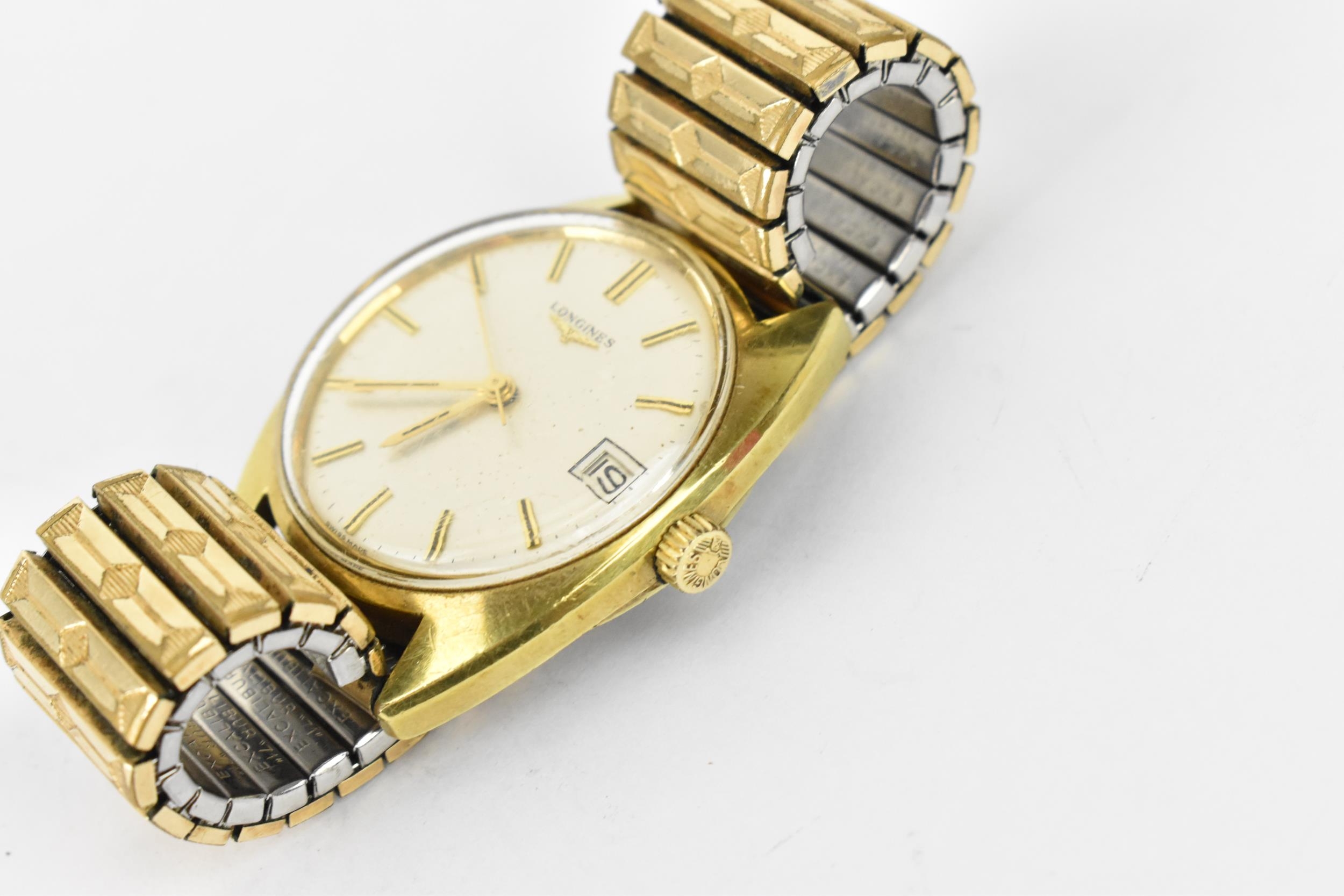 A Longines manual wind, gents, gold plated wristwatch, having a silvered dial with centre seconds, - Image 2 of 3