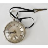A Victorian silver open faced pocket watch having an ornate silvered engraved dial with gilt