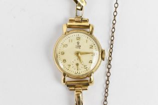 A Tudor Royal manual wind, ladies 9ct gold cased wristwatch having a white enamel dial signed