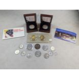 A selection of USA coinage to include a pair of boxed silver 1921 Morgan Dollars, 1941 Mercury Dime,