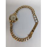A 9ct gold ladies Regency 17 jewel manual wind wristwatch, 9.5g Location: