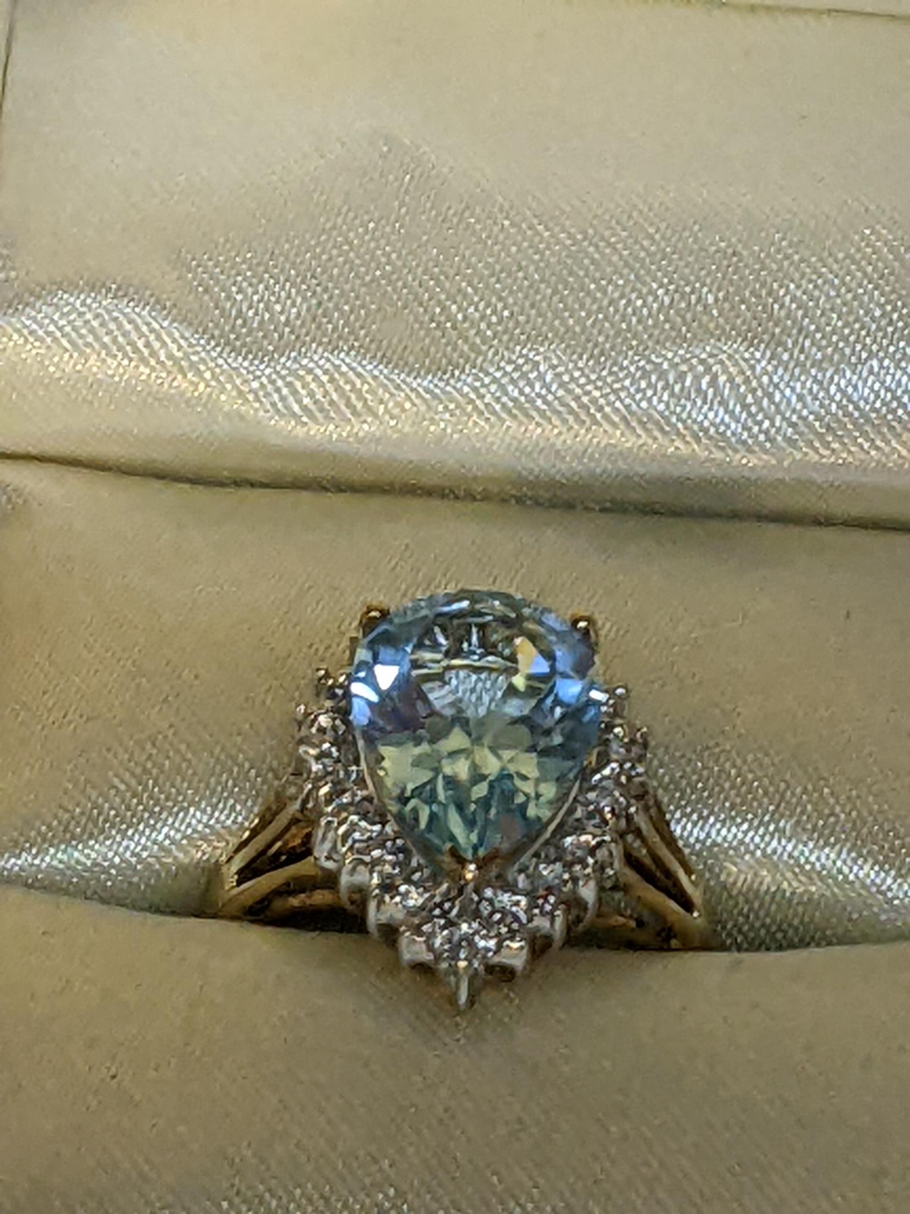 A 9ct gold aquamarine and diamond lozenge shaped ring, 3.3g Location: