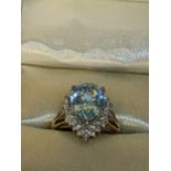A 9ct gold aquamarine and diamond lozenge shaped ring, 3.3g Location: