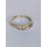 A 9ct white gold five stone diamond ring Location: