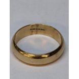 A 9ct gold wedding band, 5.3g Location: