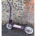 A retro Triang scooter in purple, circa 1970's with stand and rear brake Location: