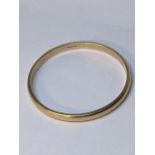 A 9ct gold bangle, 34.2g Location: