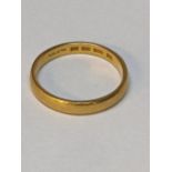 A 22ct gold wedding band, 3.4g Location: