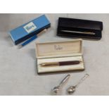 A mixed lot to include a boxed Parker fountain pen, Biro and one other, along with a 925 silver