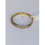 An 18ct gold half eternity ring set with diamond, 2.7g Location: