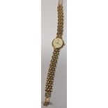 A ladies Accurist 9ct gold wristwatch on a 9ct gold bracelet 15.2g Location: