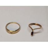 Two 9ct gold rings, one set with a garnet and the other a gypsy style ring, 3.4g Location: