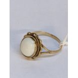 A 9ct gold ring set with an opal, 3g Location:
