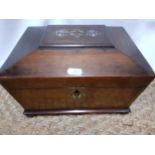 A Victorian rosewood sarcophagus work box with mother of pearl inlay and contents to include vintage