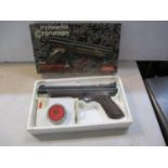 A Crossman model 1300 medallist .22 pump action air pistol with box and pellets