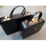 Two 20th century black vanity cases to include a Fortnum & Masons patent leather case with