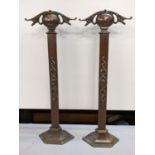 A pair of Art Nouveau copper fire dogs, 51h