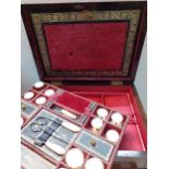 A 19th Century rosewood work box with fitted interior to include mother of pearl cotton reels and